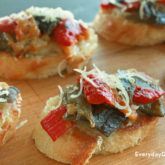 A batch of roasted pepper crostini—smoky and spicy without all the heat.