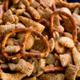 A bowl of garlic snack mix, a great game day treat.