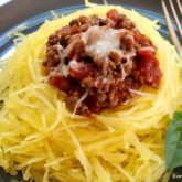 A plate of homemade spaghetti squash, ready for dinner.