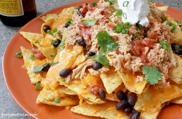 Whip up delicious, easy chicken nachos with this slow cooker recipe!