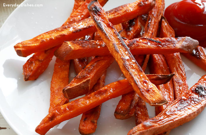 A plate of homemade baked sweet potato fries.