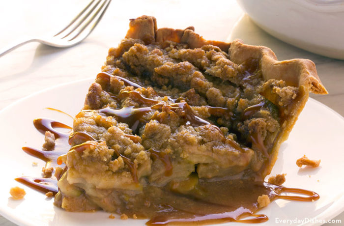A slice of a tasty caramel apple crumble.