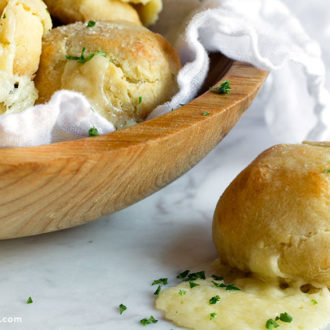A fresh batch of ooey gooey cheesy biscuits.