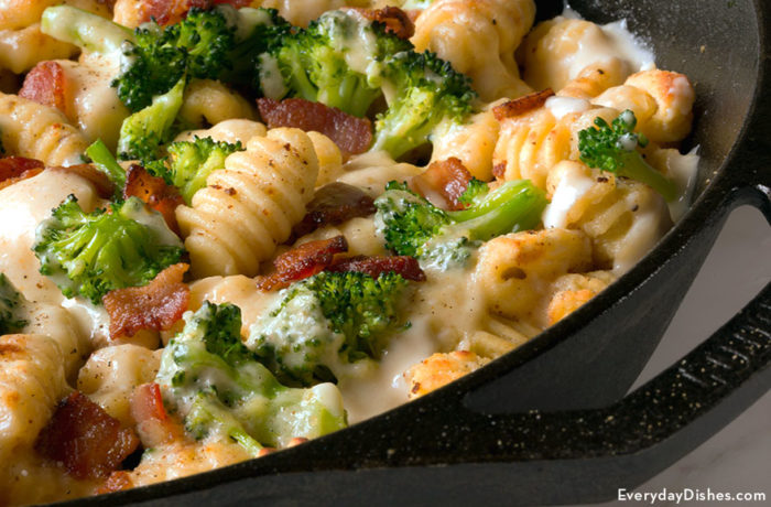 A baked gnocchi pasta dish in a skillet and ready to serve.