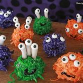 Halloween monster donut holes with colorful coconut