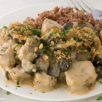 A plate of mushroom asiago chicken that's ready to serve for dinner.