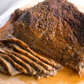 Oven-roasted beef brisket that's sliced and ready for dinner.
