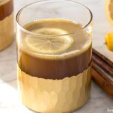 Hot buttery spiked cider with bourbon and cinnamon