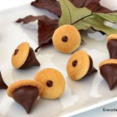 A batch of delicious and adorable vanilla wafer Hershey's kiss acorn cookies.