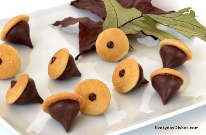A batch of delicious and adorable vanilla wafer Hershey's kiss acorn cookies.