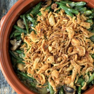 Unbelievably tasty vegan green bean casserole that's in a bowl and ready to serve for dinner.