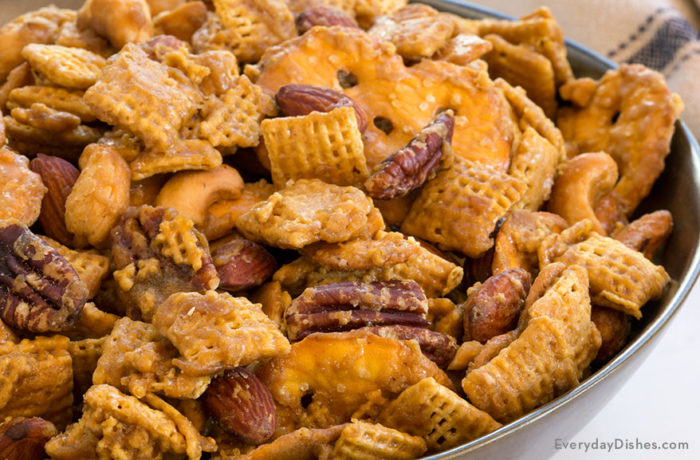 A bowl full of an addicting toffee Chex mix; the perfect snack.