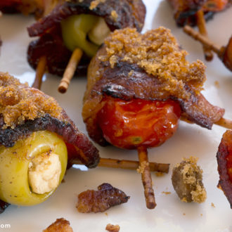 A fresh batch of bacon-wrapped olives and tomatoes.