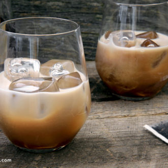 Two glasses of a delicious chai tea cocktail.