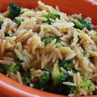 Asiago cheese orzo and broccoli in a bowl and ready to serve for dinner.