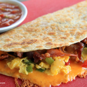 A delicious bacon breakfast quesadilla, the perfect way to start the day.