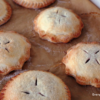 A batch of cherry hand pies that are ready for dessert.