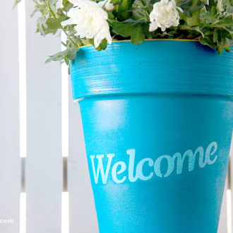 An easy welcome stenciled planter for your front porch or for a gift.
