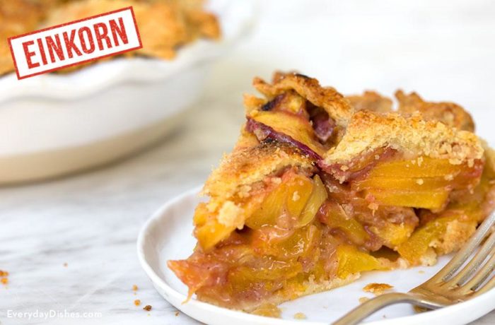A serving of homemade einkorn peach pie.