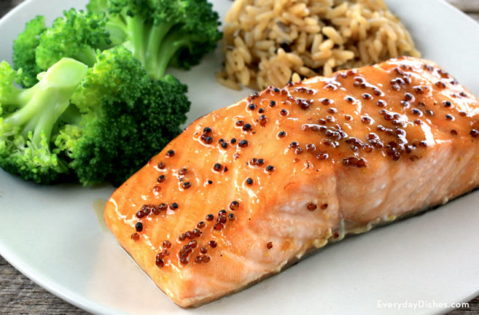 Honey mustard glazed salmon, on a plate and ready to eat for dinner.