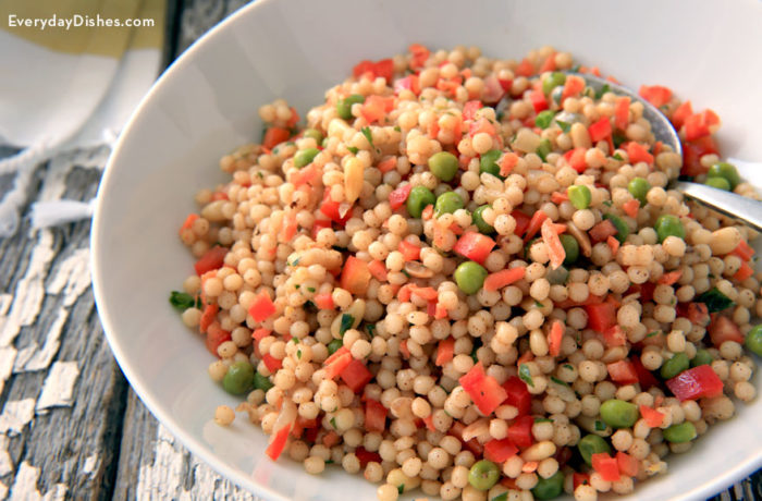 A bowl of Moroccan couscous pasta salad, ready to enjoy.