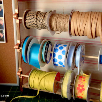 A DIY upcycled organizer for your ribbon using a drawer.