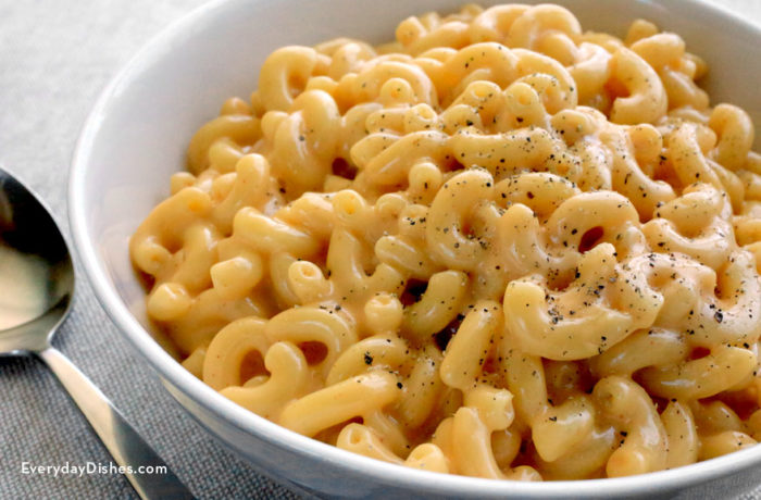 A bowl of homemade stovetop mac-n-cheese, a creamy and delicious lunch or dinner.