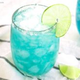A glass of a refreshing blue margarita