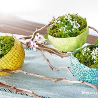 A trio of DIY paper mache Easter eggs — a great centerpiece.