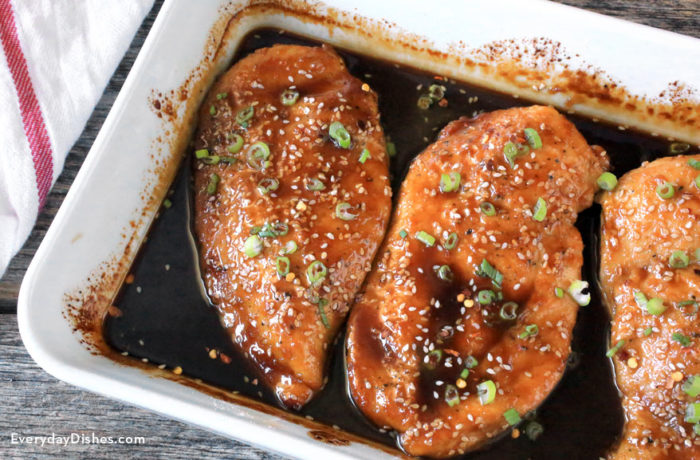 A dish with sesame garlic chicken, cooked and ready to serve for dinner.