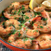 Spicy baked shrimp, in a pan and ready to serve.