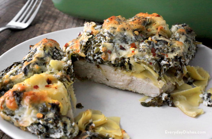 Spinach artichoke chicken, on a plate and ready for dinner.