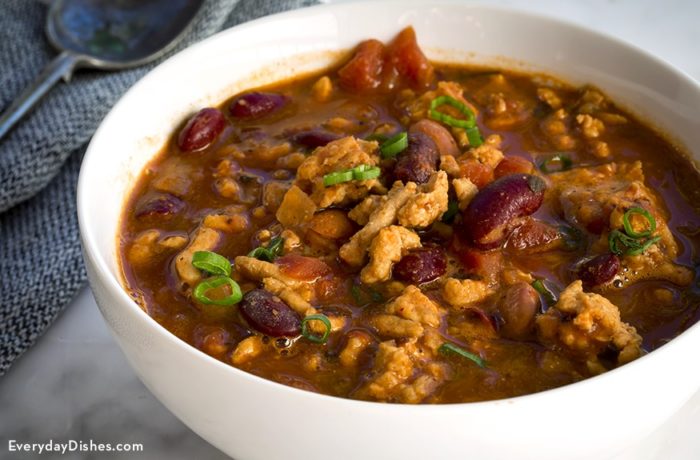 A steamy bowl of turkey chili that's ready to eat.