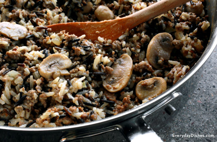 Hamburger wild rice casserole, in a skillet and ready to serve for dinner.