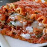 A serving of lasagna rollups that's ready to have for dinner.