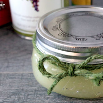 A DIY mint sugar scrub in a jar — made using essential oils and sugar.