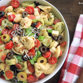 A delicious bowl of pizza pasta salad that's ready to serve