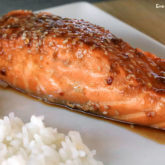 A serving of sesame garlic baked salmon, a great and healthy dinner.
