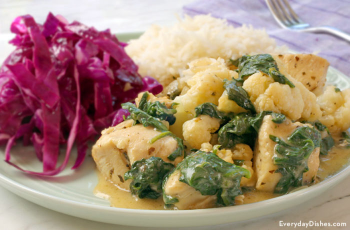Asiago chicken with spinach and cauliflower, on a plate and ready for dinner.