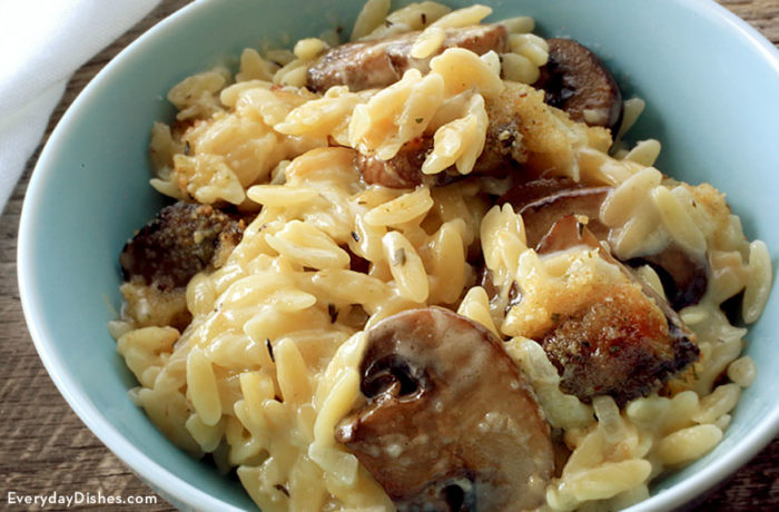 A bowl of creamy orzo with mushrooms — a delicious dinner.