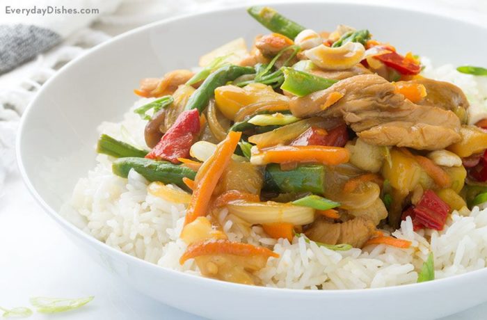 A bowl full of an easy-to=make chicken teriyaki served on rice and ready for dinner.