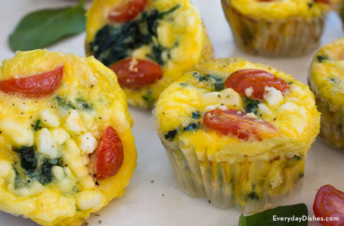 A freshly baked batch of spinach and egg muffins
