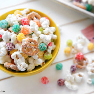 A bowl of delicious white chocolate popcorn snack mix