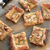 Homemade sweet and tangy apple puff pastry tarts that are perfect for dessert or breakfast.