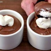 Two cups of a homemade old-fashioned chocolate pudding.