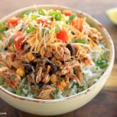 A tasty chicken burrito bowl that was made in a slow cooker.