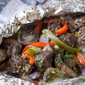 Beef and veggies after being cooked in a foil packet. A great and balanced dinner.