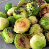 A bowl of delicious grilled brussels sprouts — a great side dish.