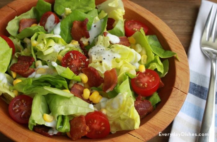 A bowl of BLT salad with homemade ranch dressing.
