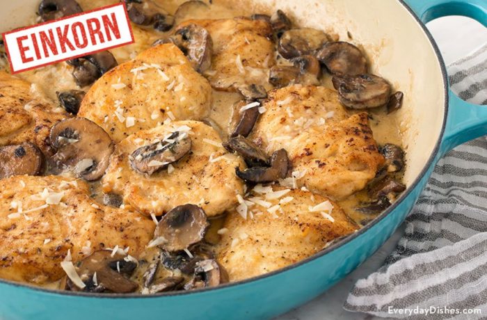 A pan of einkorn mushroom asiago chicken, ready for dinner